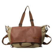 Borsa a tracolla in tela e pelle marrone, design vintage, chiusura a zip, manici regolabili, ideale per viaggi e uso quotidiano.