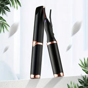 Pettine riscaldato per ciglia nero e oro rosa, design elegante, portatile, ideale per arricciare ciglia, accessorio bellezza essenziale.