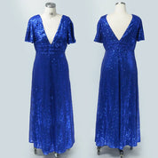 Abito lungo blu con paillettes, scollo a V profondo, maniche corte, elegante e scintillante, perfetto per eventi serali e cerimonie.