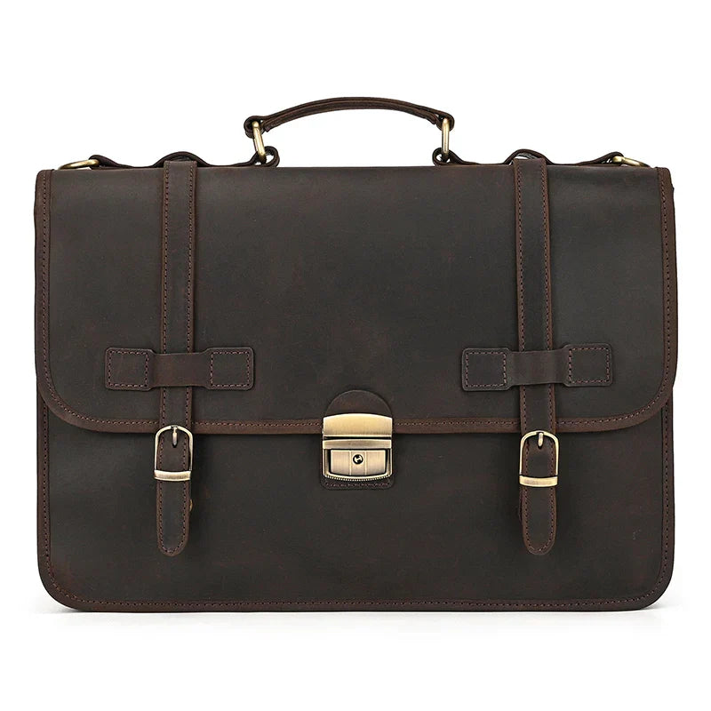 Borsa ventiquattrore in pelle marrone scuro con fibbie e manico superiore. Elegante e professionale, ideale per lavoro e ufficio.