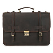 Borsa ventiquattrore in pelle marrone scuro con fibbie e manico superiore. Elegante e professionale, ideale per lavoro e ufficio.