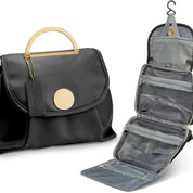 Borsa nera elegante con manico dorato e organizer da viaggio pieghevole con ganci e tasche multiple, ideale per accessori e cosmetici.