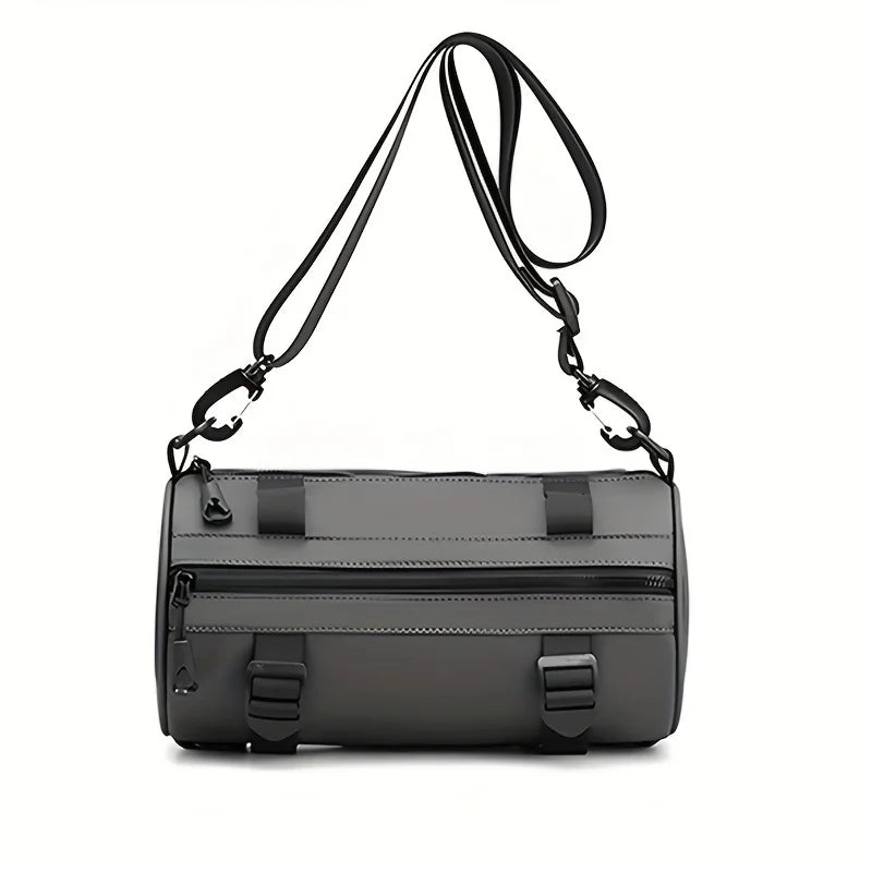 Borsa a tracolla cilindrica nera in pelle sintetica, con cerniere multiple e cinturino regolabile. Design moderno e versatile per uomo e donna.
