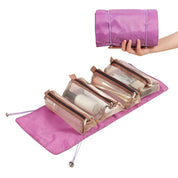 Astuccio da viaggio rosa con scomparti trasparenti per cosmetici, arrotolabile e portatile. Ideale per organizzare trucchi e accessori.