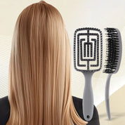 Spazzola per capelli anti-nodi con setole morbide, ideale per capelli lisci e lunghi. Design ergonomico, perfetta per districare senza dolore.