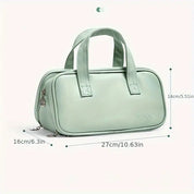 Borsa a mano verde menta in pelle sintetica, dimensioni 27x16x14 cm, con doppio manico e cerniera. Elegante e pratica per uso quotidiano.