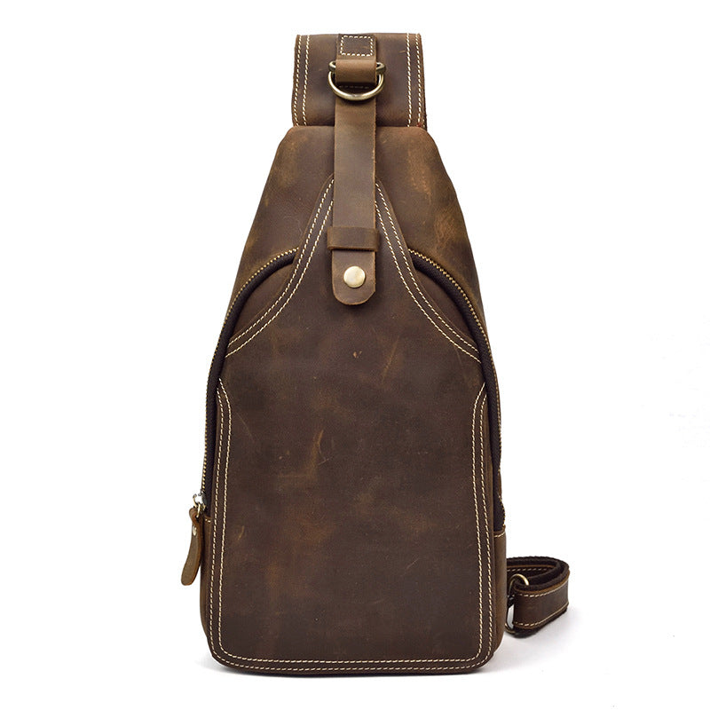 Zaino monospalla in pelle marrone vintage, design elegante con cuciture a contrasto, ideale per uomo, moda casual, accessorio pratico e resistente.