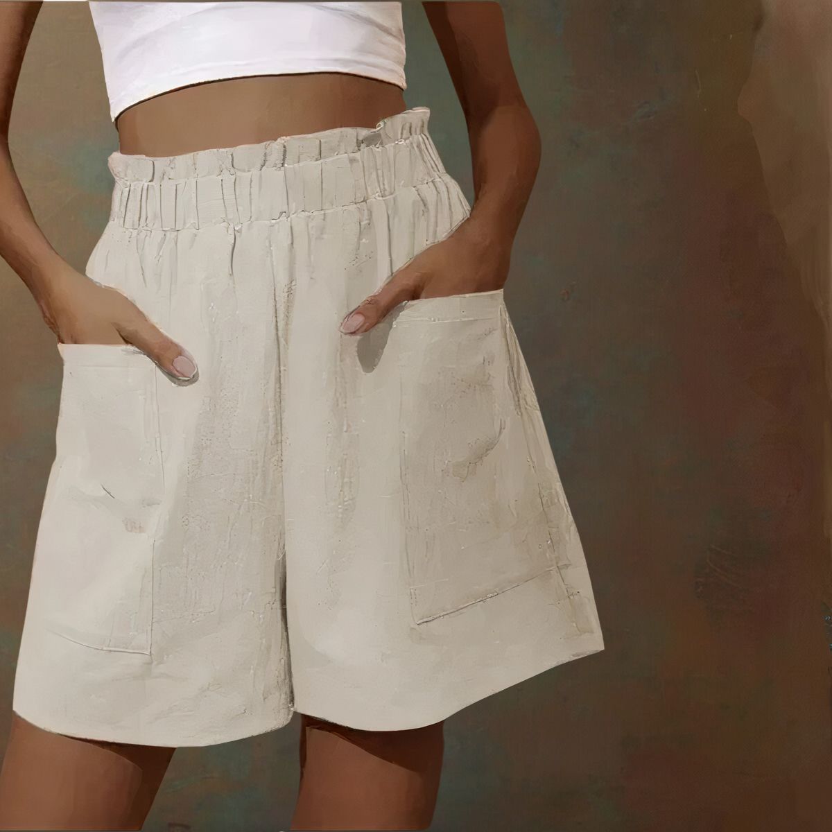 Shorts beige a vita alta con tasche grandi, indossati da una persona con top bianco. Stile casual estivo, moda donna, abbigliamento comodo.