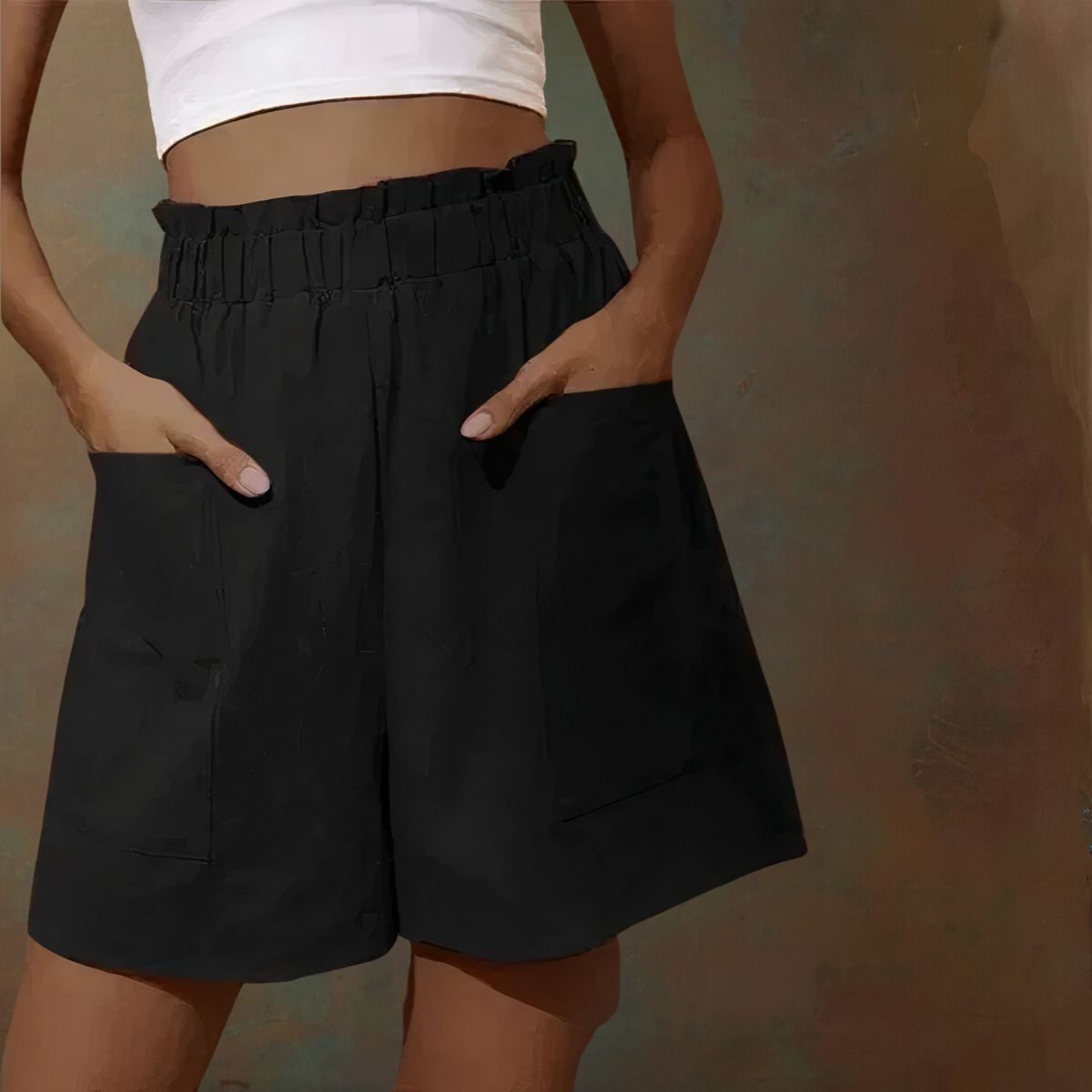 Shorts neri a vita alta con tasche, indossati da una persona con top bianco. Moda estiva casual, abbigliamento donna, stile comodo ed elegante.