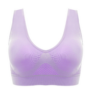 Reggiseno sportivo viola senza cuciture, design traspirante, supporto medio, tessuto elastico, ideale per fitness e yoga.