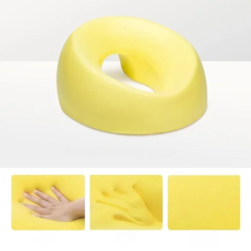 Cuscino ergonomico giallo in memory foam, design a ciambella per supporto lombare. Ideale per ufficio e casa, allevia la pressione.