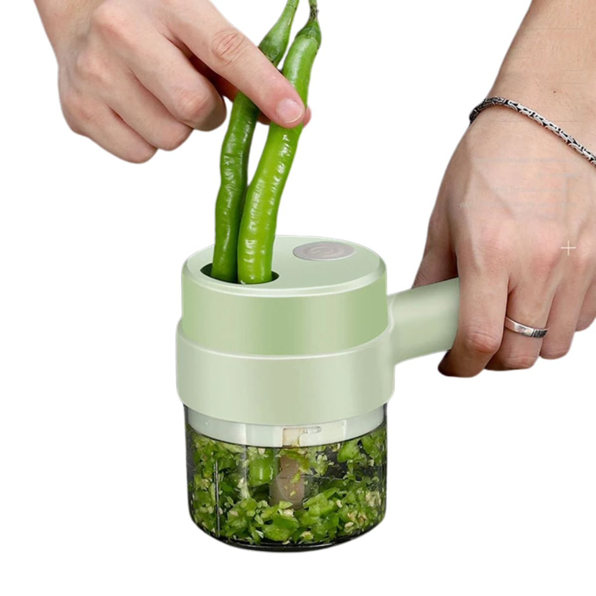 Tritatutto manuale verde con manico, utilizzato per tritare peperoncini verdi freschi. Utensile da cucina compatto ed efficiente per verdure.