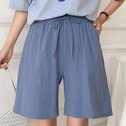Pantaloncini donna blu, vita alta con laccio, tessuto leggero, stile casual estivo. Ideali per moda femminile, abbigliamento comodo.
