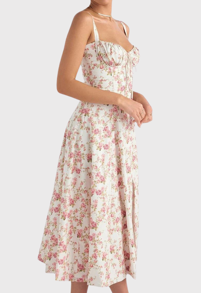 Abito estivo donna floreale bianco e rosa, lunghezza midi, spalline sottili, scollo a cuore, perfetto per occasioni casual e primaverili.