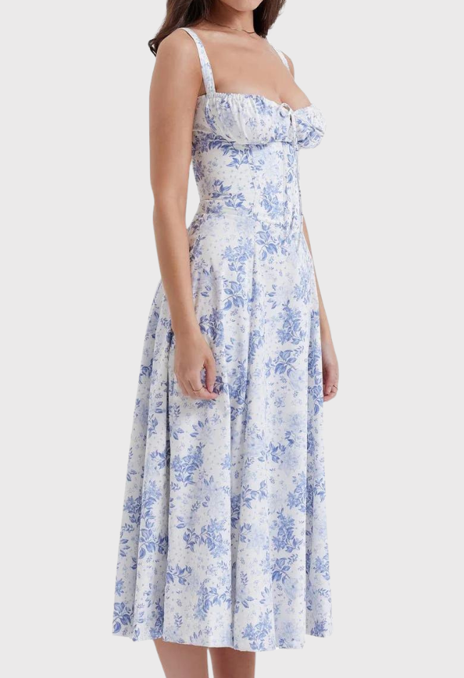 Abito estivo donna floreale bianco e blu, lunghezza midi, spalline sottili, scollo a cuore, perfetto per occasioni casual ed eleganti.