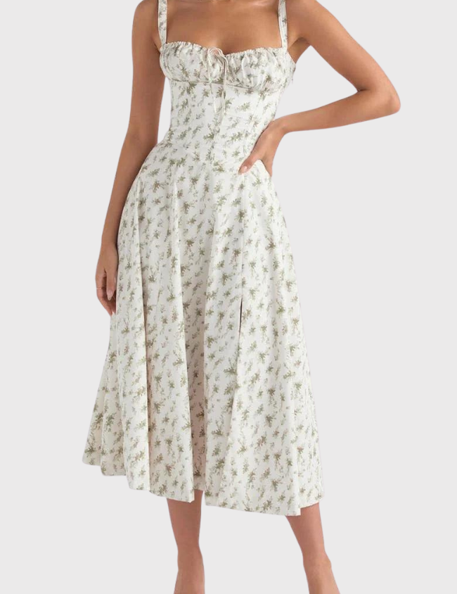Abito midi estivo bianco a fiori, spalline larghe, scollo a cuore, gonna svasata, perfetto per occasioni eleganti e casual.
