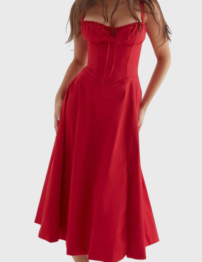Abito lungo rosso elegante con spalline, scollo a cuore e gonna ampia. Perfetto per eventi formali e serate speciali. Moda donna, abbigliamento chic.
