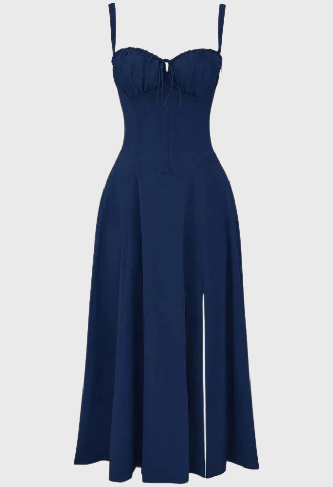 Abito lungo blu scuro con spalline sottili, scollo a cuore e gonna ampia. Elegante e adatto per eventi serali o cerimonie.