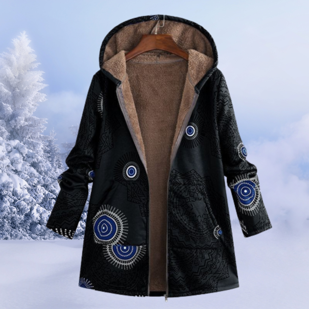 Cappotto invernale nero con cappuccio, interno in pelliccia sintetica, motivo geometrico blu e bianco, ideale per climi freddi.