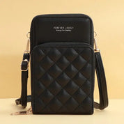Borsa a tracolla nera in pelle trapuntata, design compatto con tasca frontale, ideale per smartphone. Elegante e funzionale per ogni occasione.