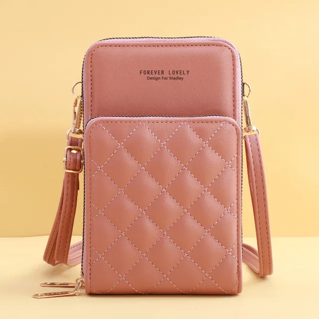 Borsa a tracolla rosa trapuntata in pelle sintetica, design compatto con tasca frontale, ideale per smartphone e accessori. Elegante e funzionale.