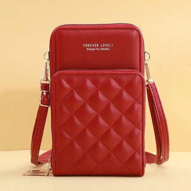 Borsa a tracolla rossa trapuntata in pelle sintetica, design compatto con cerniera, ideale per smartphone e accessori, moda donna elegante.