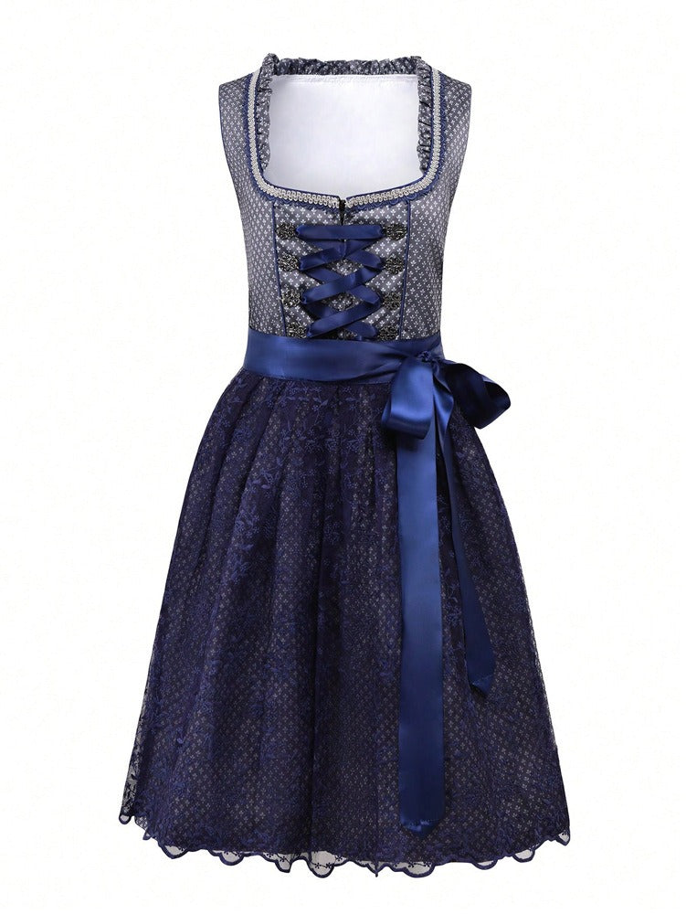 Abito Dirndl autunnale con grembiule, pizzo ed elegante allacciatura del corpetto