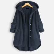 Giacca donna invernale blu scuro con cappuccio, bottoni frontali, tessuto trapuntato, maniche lunghe, design casual. Perfetta per look autunnali.