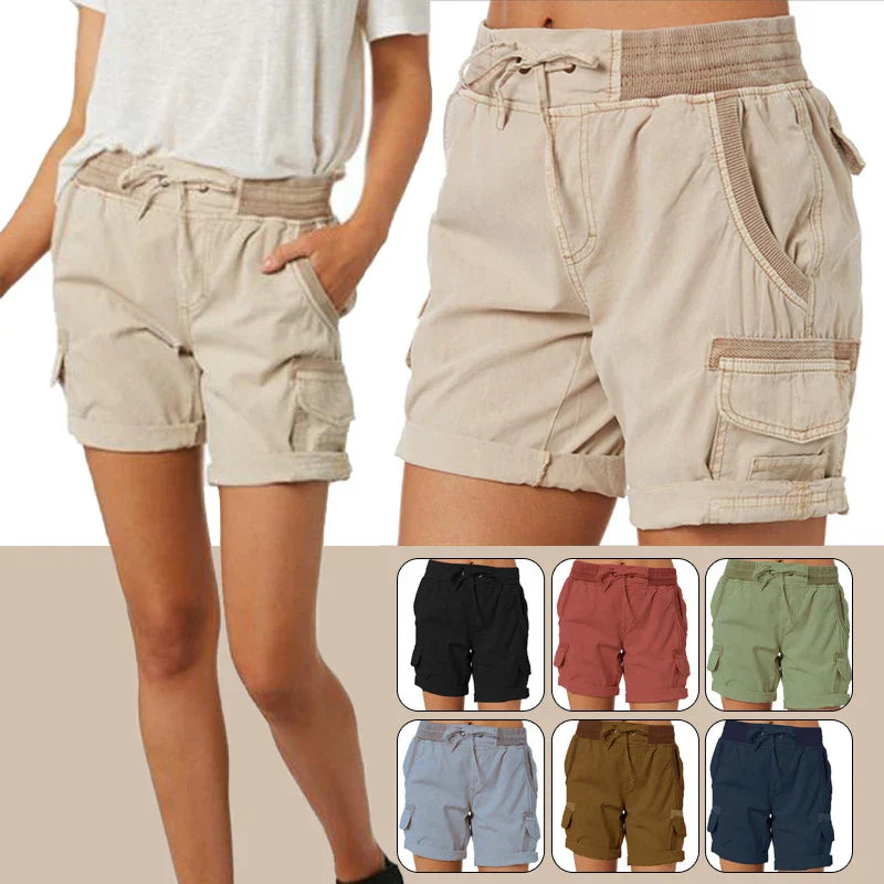 Shorts cargo da donna in cotone beige con tasche multiple, disponibili in vari colori. Ideali per l'estate e attività all'aperto.