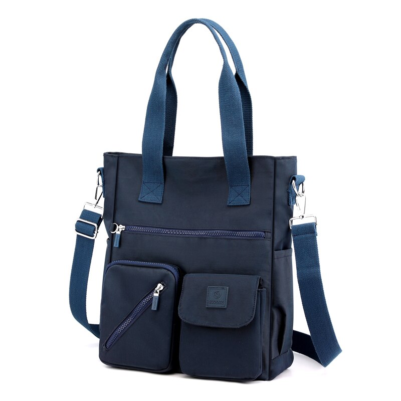 Borsa a tracolla blu in nylon con tasche multiple, manici resistenti e tracolla regolabile. Design moderno, ideale per lavoro e viaggio.