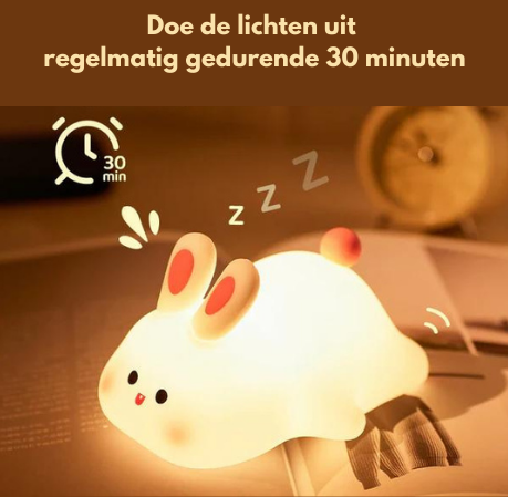 Lampada notturna a forma di coniglio, luce calda e soffusa, ideale per camera da letto bambini. Timer 30 minuti, design carino e rilassante.