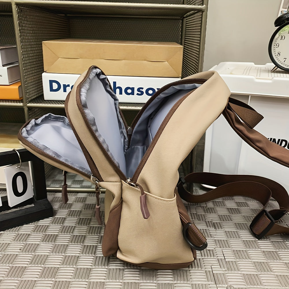 Zaino beige e marrone aperto, con scomparti multipli, su scaffale. Design moderno, ideale per scuola o lavoro. Accessorio versatile e funzionale.