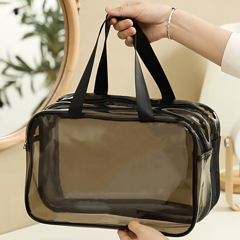 Borsa trasparente in PVC con manici neri, ideale per viaggi e palestra. Design elegante e pratico, perfetta per trasportare oggetti personali.