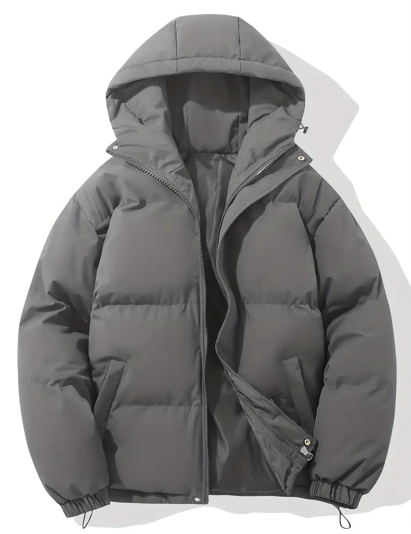 Giacca invernale imbottita grigia con cappuccio, zip frontale e tasche laterali. Ideale per uomo, moda casual, abbigliamento caldo.