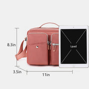 Borsa a tracolla rosa con tasche multiple, dimensioni 11x3.5x8.3 pollici, compatibile con iPad. Design elegante e pratico per uso quotidiano.