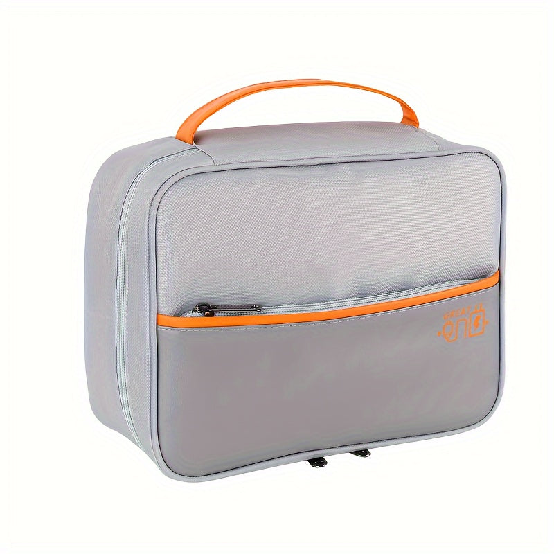 Borsa termica grigia con manico arancione, tasca frontale con cerniera, design moderno, ideale per pranzo al sacco, picnic, viaggio.