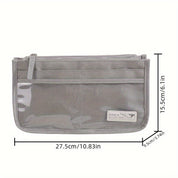 Organizzatore da viaggio grigio con tasche trasparenti, dimensioni 27,5x15,5x9,5 cm, ideale per accessori, cosmetici e documenti.