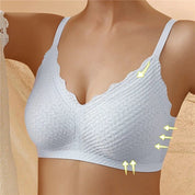 Reggiseno bianco senza cuciture, design a V profondo, spalline regolabili, tessuto traspirante, supporto confortevole, ideale per uso quotidiano.