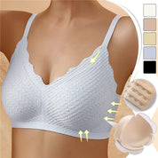 Reggiseno senza cuciture bianco, design a onde, imbottito, spalline regolabili, chiusura a ganci, comfort quotidiano, disponibile in vari colori.