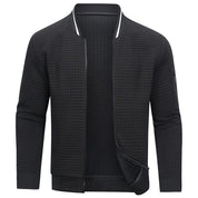 Giacca bomber uomo nera, tessuto trapuntato, zip frontale, polsini e colletto a costine, stile casual elegante, moda autunno inverno.