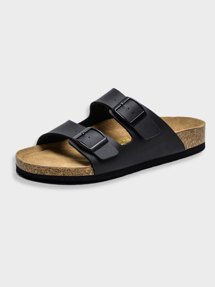 Sandalo unisex in pelle nera con doppia fibbia regolabile, suola in sughero e plantare ergonomico. Calzatura estiva comoda e alla moda.