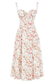 Abito estivo floreale donna, bianco con stampa rosa, scollo a cuore, spalline sottili, lunghezza midi, elegante e femminile, moda primavera estate.