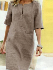 Abito donna in lino beige, maniche corte, scollo a V, stile casual elegante. Perfetto per l'estate, moda femminile, abbigliamento leggero.