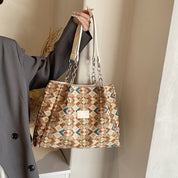 Borsa a tracolla geometrica multicolore con catena, design elegante e moderno, perfetta per moda donna, accessorio versatile e di tendenza.