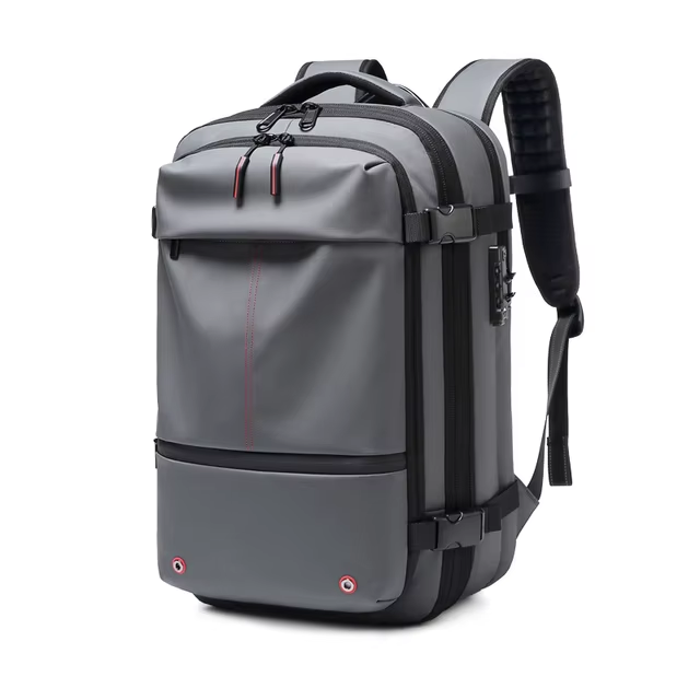 Zaino da viaggio grigio impermeabile, design moderno, con tasche multiple e spallacci imbottiti, ideale per laptop e accessori, perfetto per lavoro e avventure.