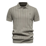 Maglietta polo uomo grigia, maniche corte, design a righe verticali, tessuto leggero, stile casual elegante, perfetta per ogni occasione.