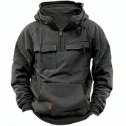Felpa nera con cappuccio, tasche frontali e zip, design casual e sportivo, ideale per l'autunno e l'inverno. Abbigliamento uomo alla moda.