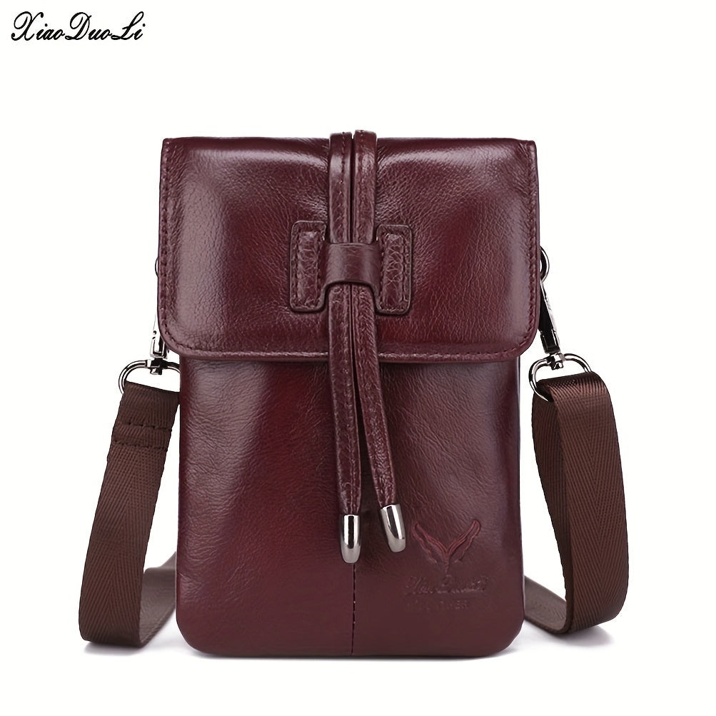 Borsa a tracolla in pelle marrone, design elegante e compatto, con chiusura a coulisse e tracolla regolabile. Accessorio moda uomo/donna.