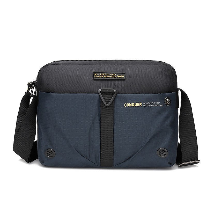 Borsa a tracolla unisex nera e blu, design moderno, con tasche multiple e cerniera, ideale per lavoro e viaggio. Accessorio moda pratico e versatile.