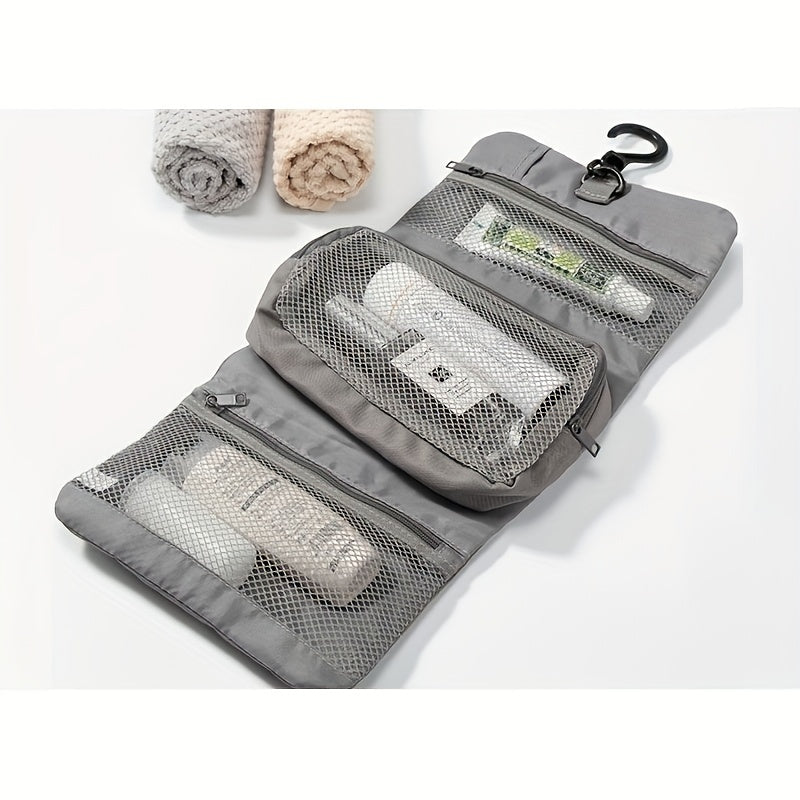 Borsa da viaggio grigia con gancio, scomparti a rete, contenente articoli da toeletta. Ideale per organizzare prodotti cosmetici e accessori.